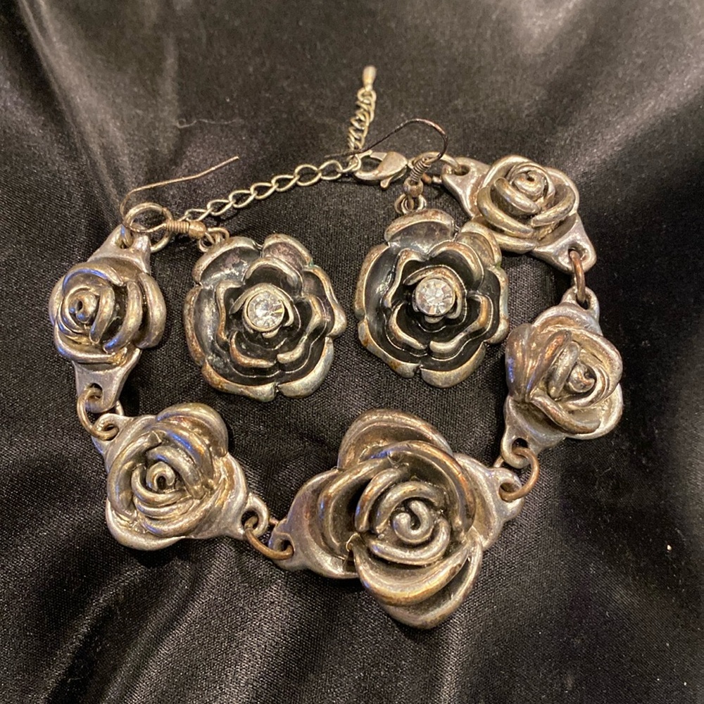 Silver rose earrings and matching bracelet